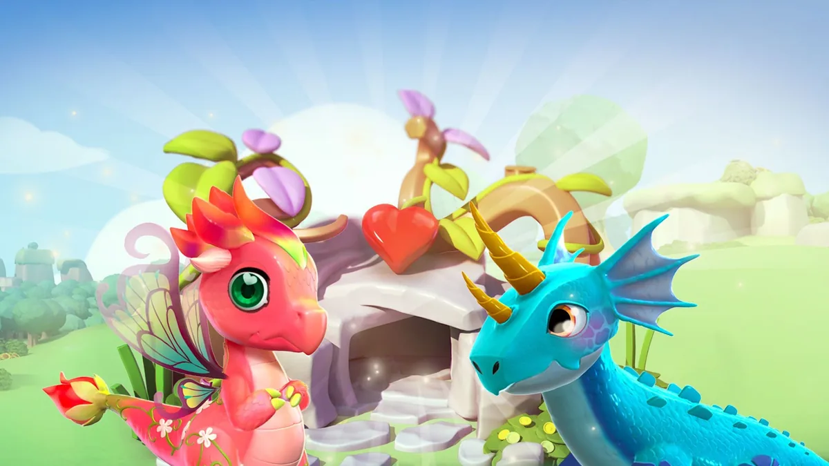 Dragon Mania Legends: ein rosafarbener und ein blauer Drache vor einem steinernen Zuchtgebäude mit einem roten Herz